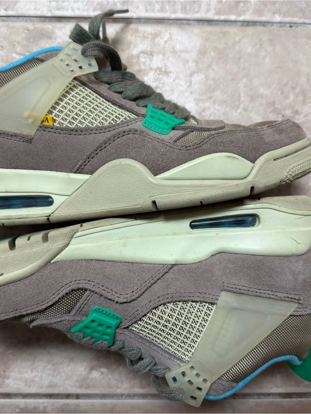 Jordan 4 union Sneakers in Taupe with Teal and Blue Accents